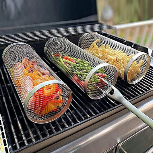 Mesh vegetable grilling baskets with vegetables on a grill